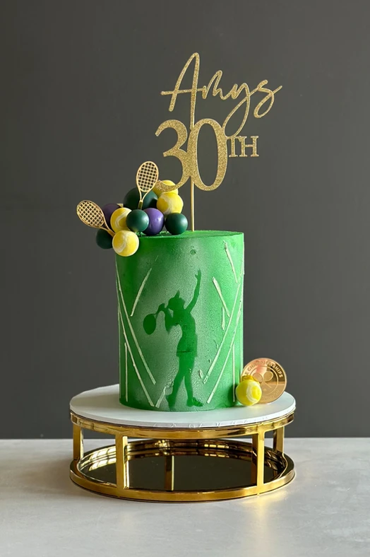 Green tennis-themed birthday cake