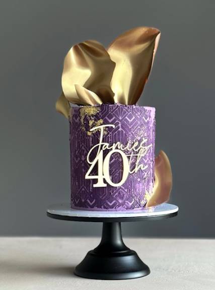 Purple and gold birthday cake