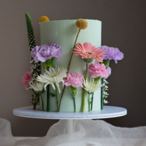 mint birthday cake with flowers Perth