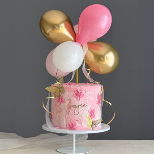 pink floral birthday cake with ballons perthshire